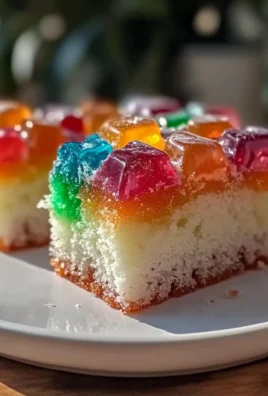 Colorful Creamy Rainbow Jello Poke Cake Recipe Easy Step by Step Guide