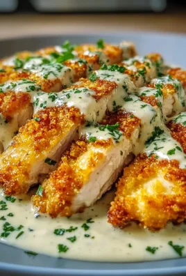 Crispy Parmesan Chicken with Creamy Garlic Sauce